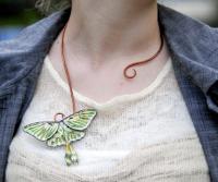 Luna Moth worn as necklace