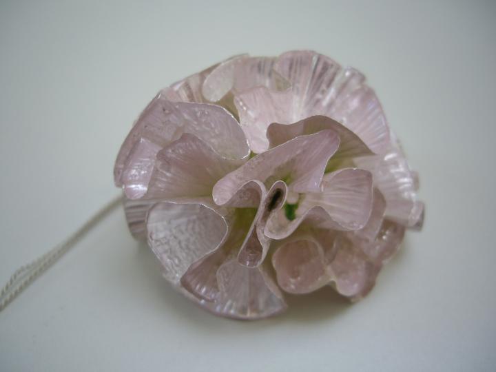 Pom-pom pendant.