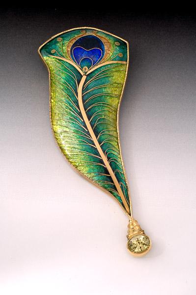 Peacock brooch.