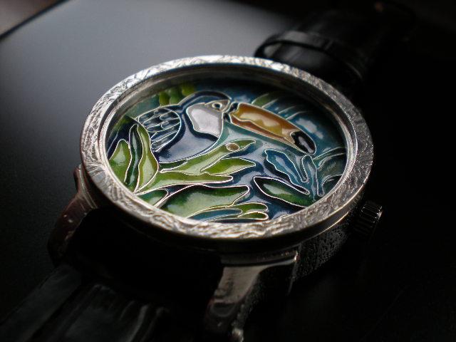 Tukan enamel dial watch